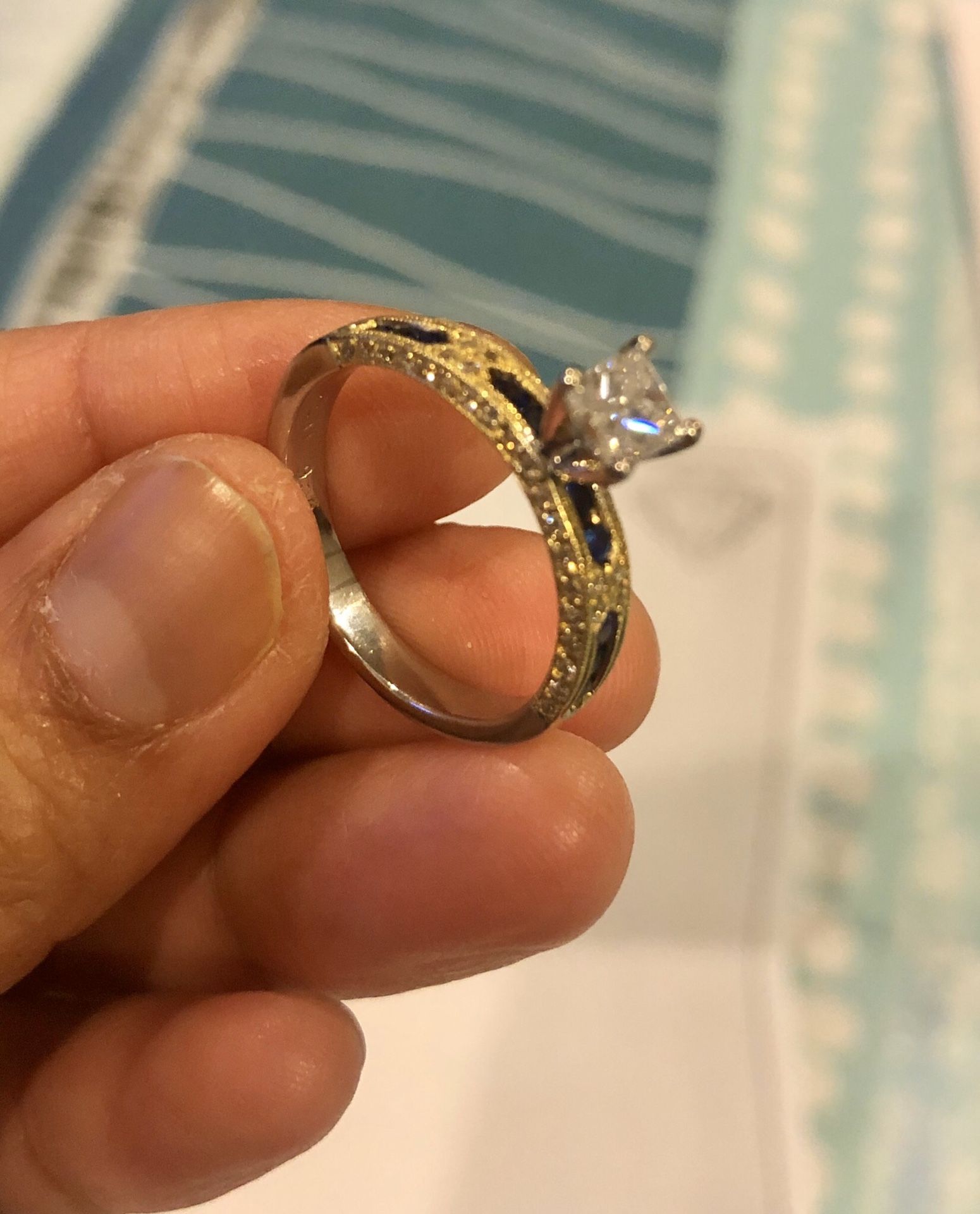 Diamond/platinum/gold engagement ring