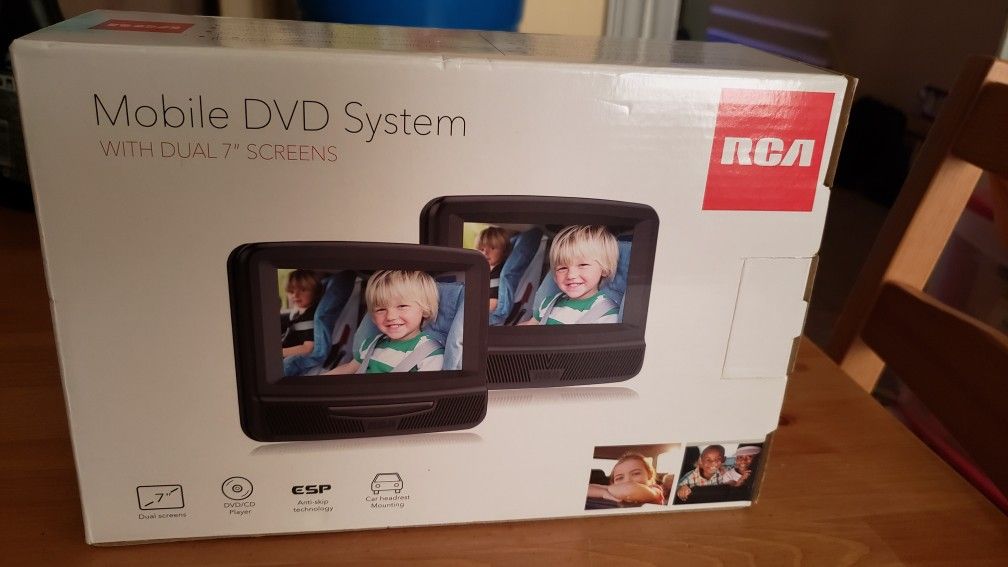 BRAND NEW Dual Mobile DVD system. 2 Screens, with headrest harness