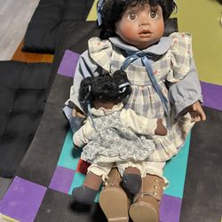 Porcelain Doll With Her Babydoll
