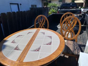 Table and three chairs