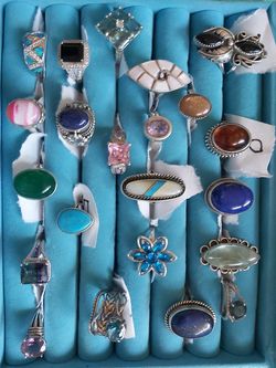 Silver rings real stones 475 takes all today only. 5 of them are not available. Good deal, wont last, no holds.