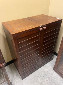 Dark Wood Cabinet with Louvered Doors