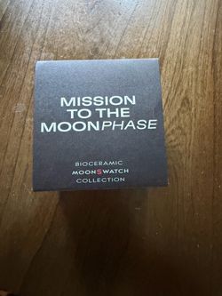 Swatch Mission to the Moonphase New Moon