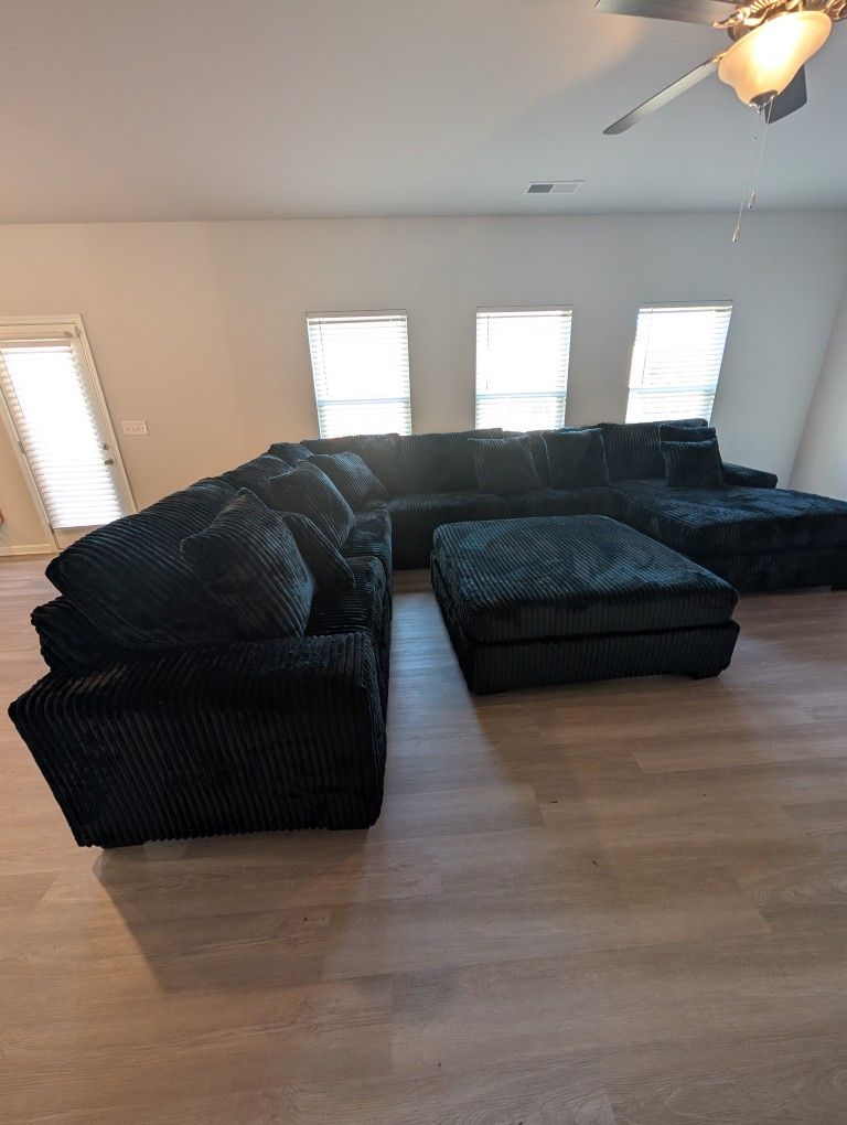 Comfy 6PC Black Plush Reversible Sectional & Ottoman