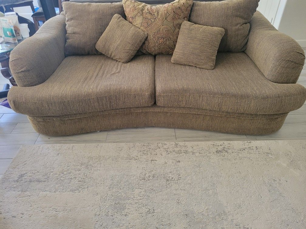 Three piece Sofa and Love Seat Good Condition