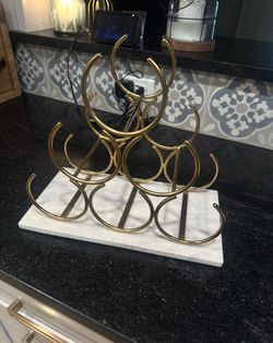 Marble and gold wine holder