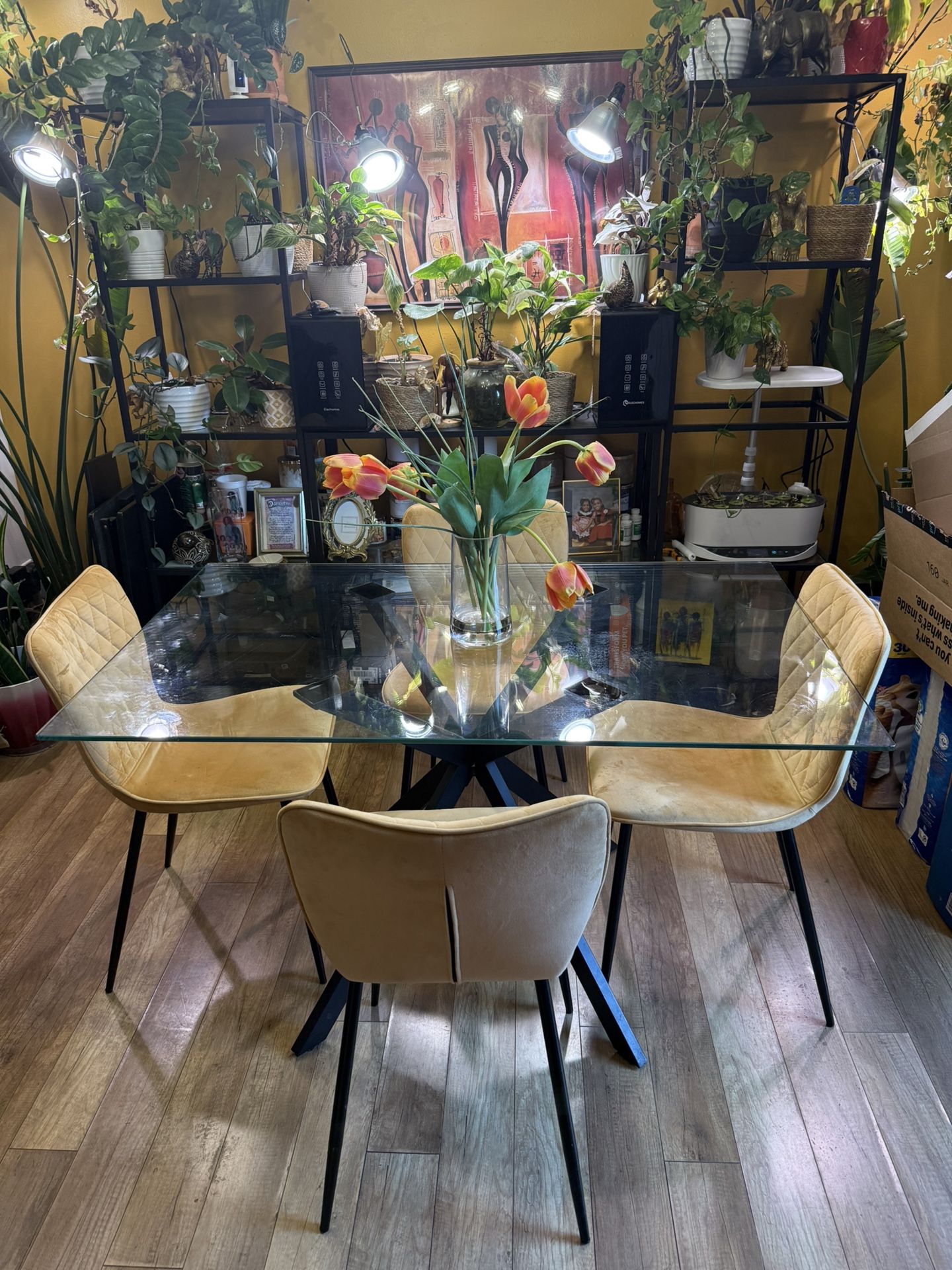 Tempered Glass Dining Table and Upholstered Side Chairs ( Black legs and yellow chairs)