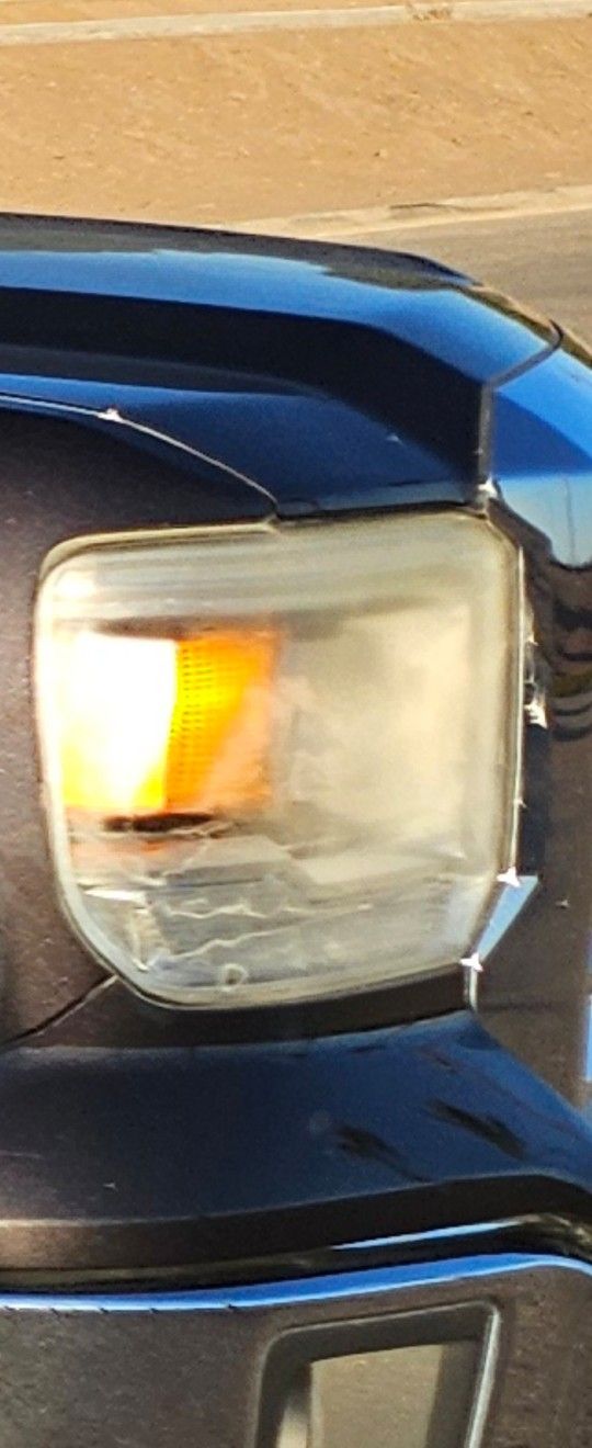 Used OEM GMC Sierra Headlight Assembly 