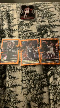 Three orange foil basketball cards
