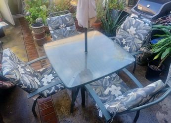 Patio table with chairs and cushions - no umbrella