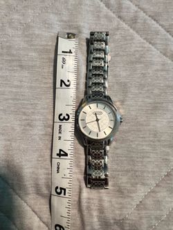 Coach woman’s watch (up to 8 inch wrist ( tight))