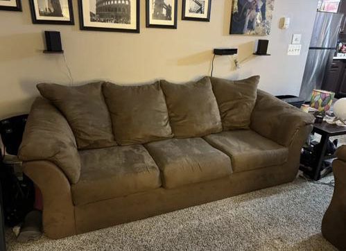 Up for sale is an Ashley Furniture Couch and Loveseat!
