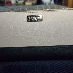 Fabulous Kate Spade cream and black  savino leather wallet. Like new