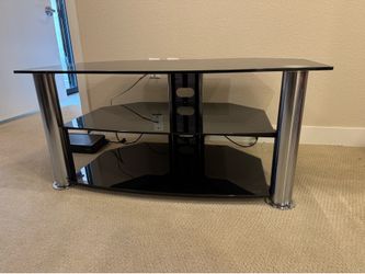 Black glass and chrome TV stand