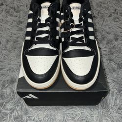 Size 8.5, men’s brand new unworn Adidas shoes with tags and box