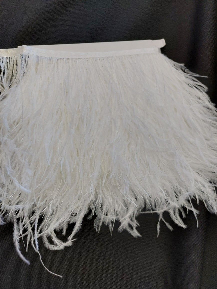 Plumas En Tira $ 10 La Yarda