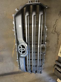 2022 2025 TOYOTA TUNDRA GRILLE ASSEMBLY OEM FRONT CENTER GRILL W/ CAMERA HOLE