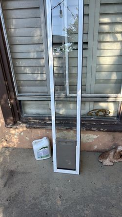 Pet safe sliding glass pet door