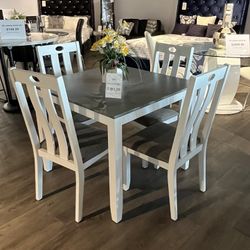 Table And 4 Chairs 