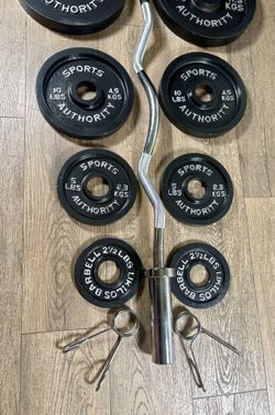 Beautiful  Equipment: Curl Bar W/Cooper Bearings & Pair of Weight Plates 25s, 10s, 5s And 2.5 Pounds. (Total: 105 lbs)  