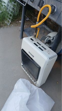 Portable (natural gas) heater     Calentón de ( gas natural) portátil
