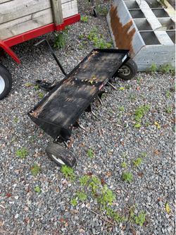 Riding mower aerator