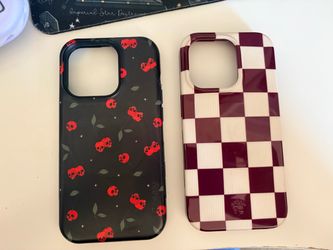 iPhone 14 Pro cases checked, skulls and cherries