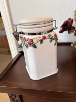 Inspirado stone light Seattle USA canister cookie jar with berries and vines latch.