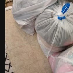 I Have 2 Bags Of Woman  And Boys Clothes.  . Woman Has Mix Sizes Mostly L 