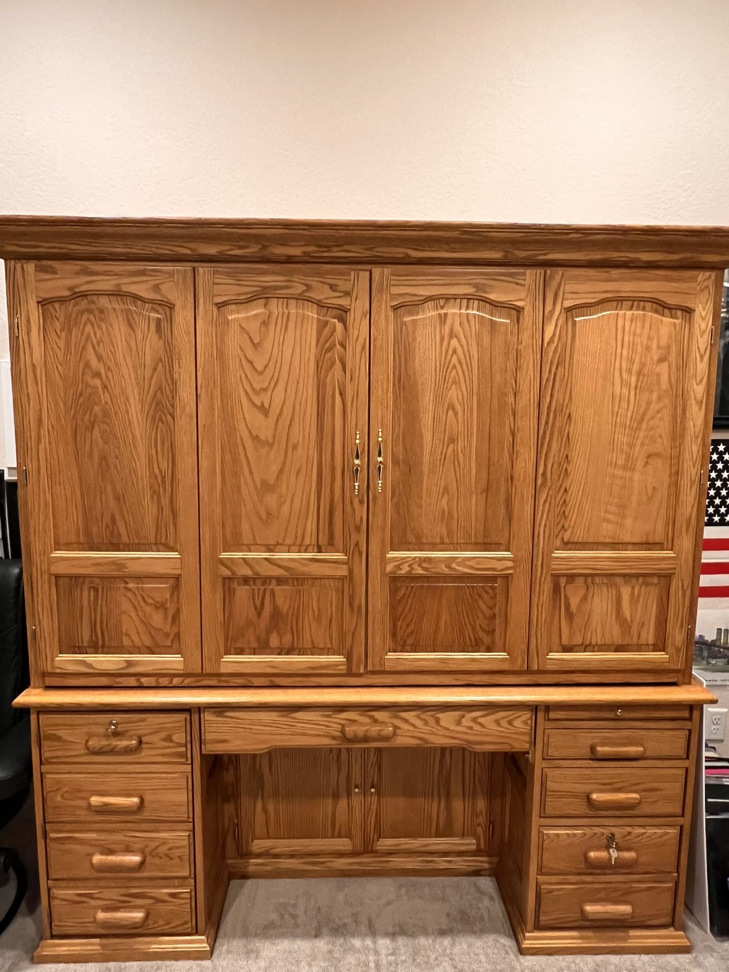 Solid wood computer center/desk-lots of storage with lighting as well.-Great Condition