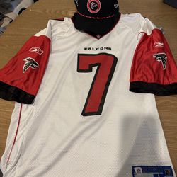 Falcons jersey/Hat Michael Vick  size Large