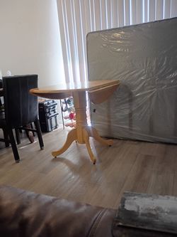 2 new fullsize mattress and box springs and a dining table no chairs