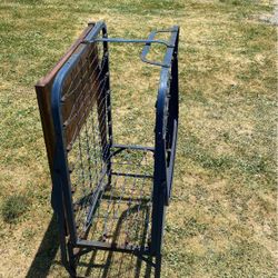 Antique Cot With A Backboard
