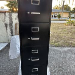 FILE CABINET 4 DRAWERS AND DELIVERY IS AVAILABLE 