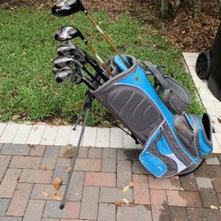 Mens Slazenger hybrid golf club set.  Complete right handed set with golf bag