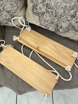 Two tan/beige Hanging Shelves
