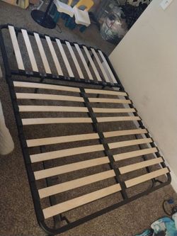 Twin size metal futon bed frame with wood slats