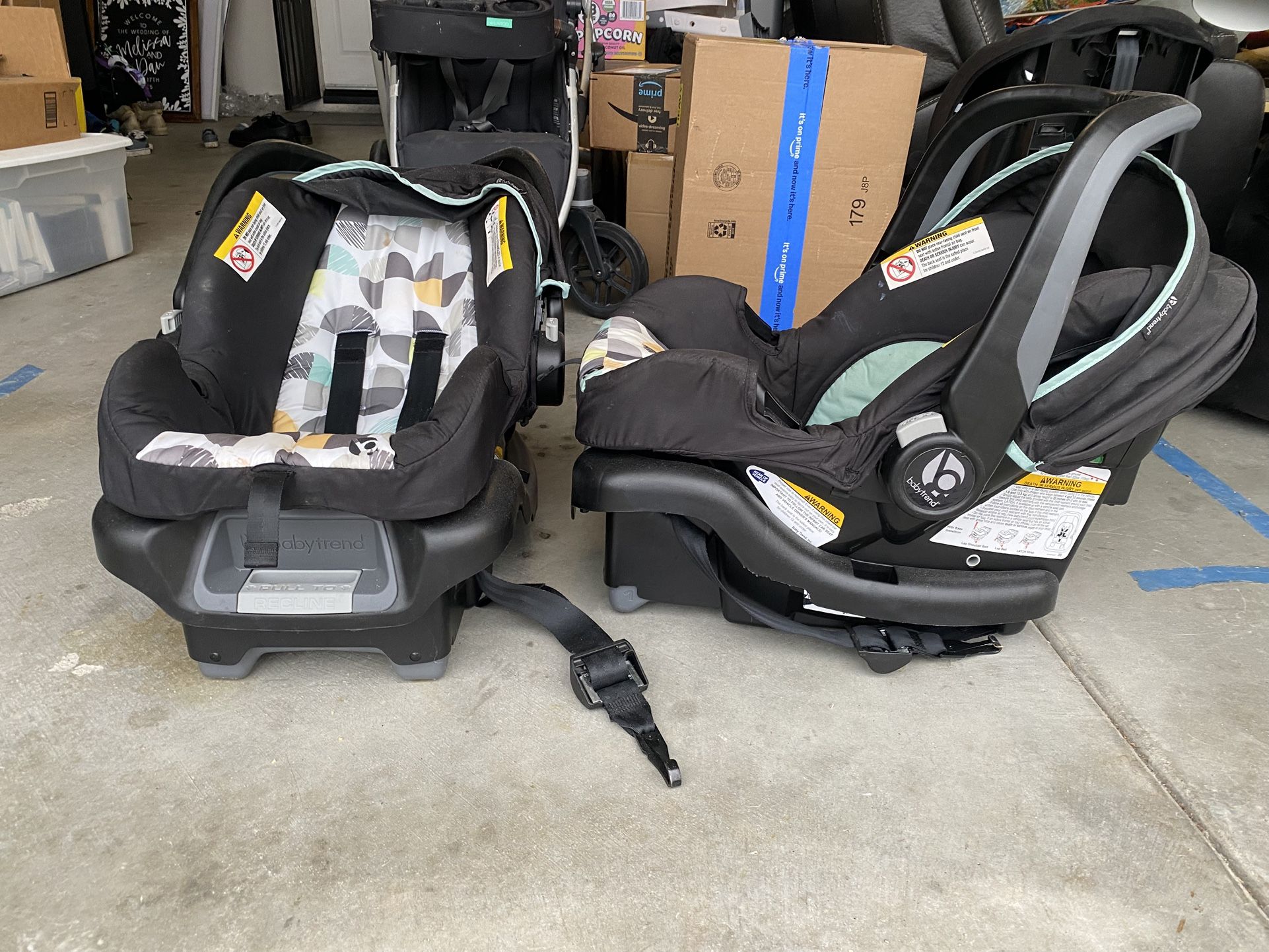 Two BabyTrend Infant Car seats
