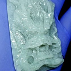 Burmese icy type A jadeite jade pendant lucky Dragon Face. Certified.