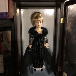 Camellia gardens 16 inch porcelain doll featuring sure Swarovski Crystal components
