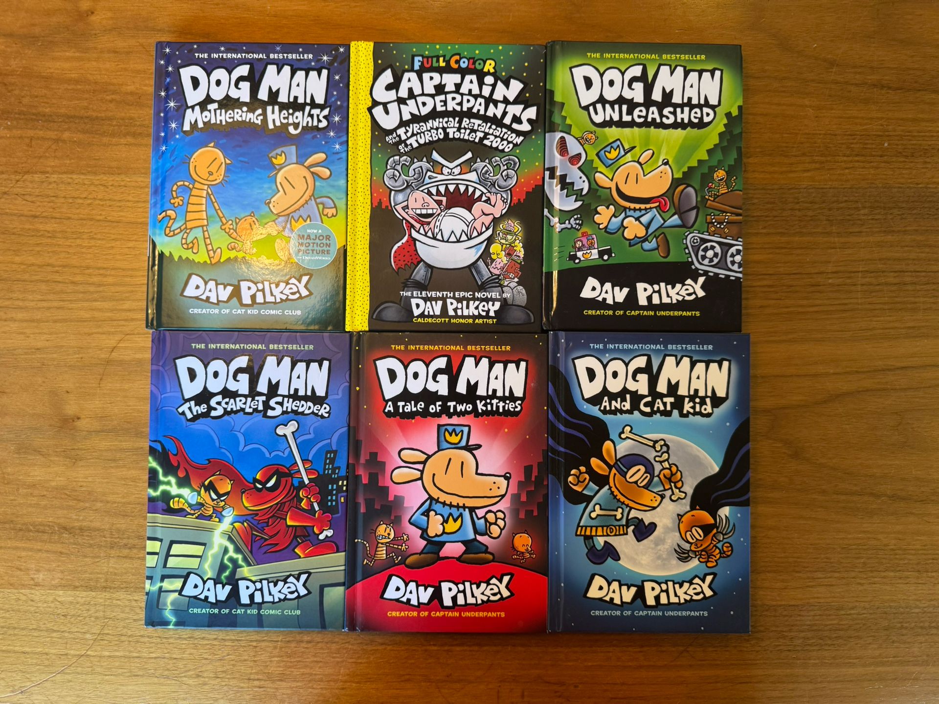 5 Dog Man Books and 1 Captain Underpants