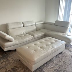 White Leather L Couch And Ottoman And Rug