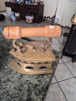 Vintage solid brass Iron