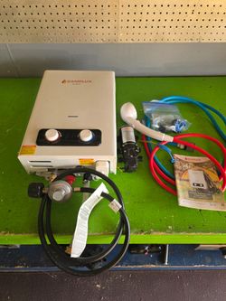 Camplux Pro tankless propane hot water heater with 12 volt pump