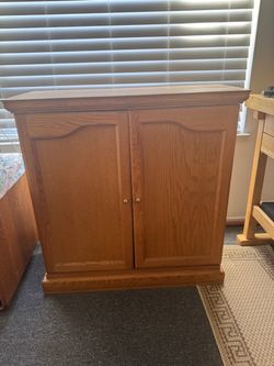 Oak cabinet for DVDs ,  entertainment equipment