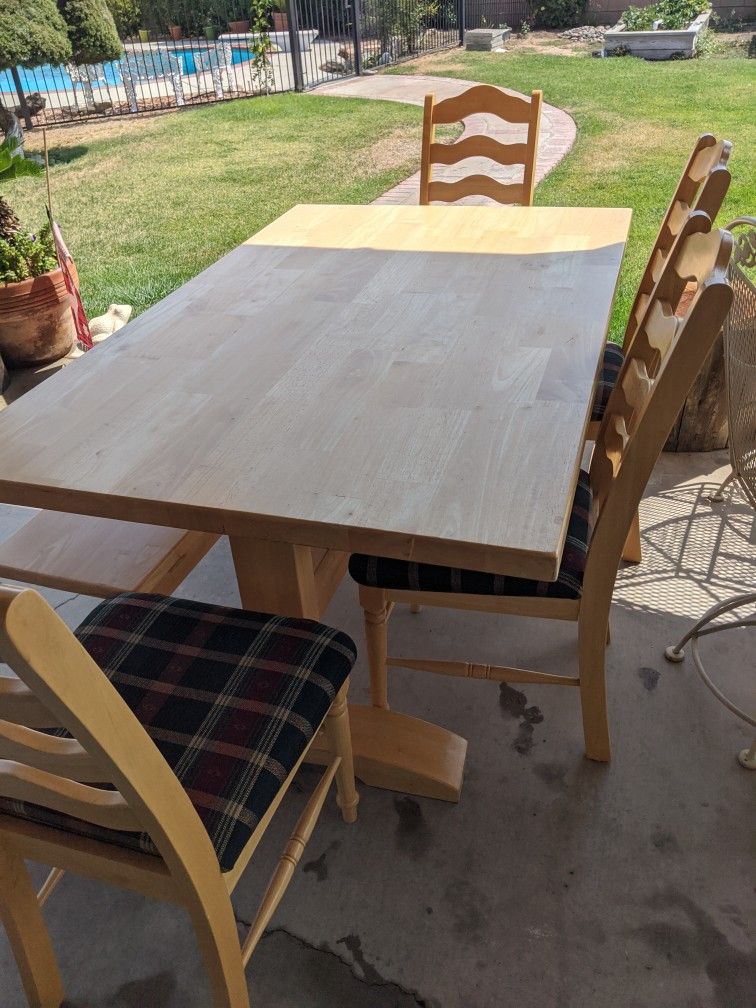 NICE SOLID TRESTLE TABLE WITH FOUR LADDER BACK CHAIRS AND BENCH SEAT