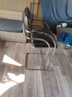 Black Leather And Chrome It's A Tall Chair