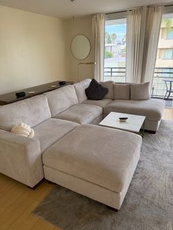 Thomasville sectional cream couch with ottoman