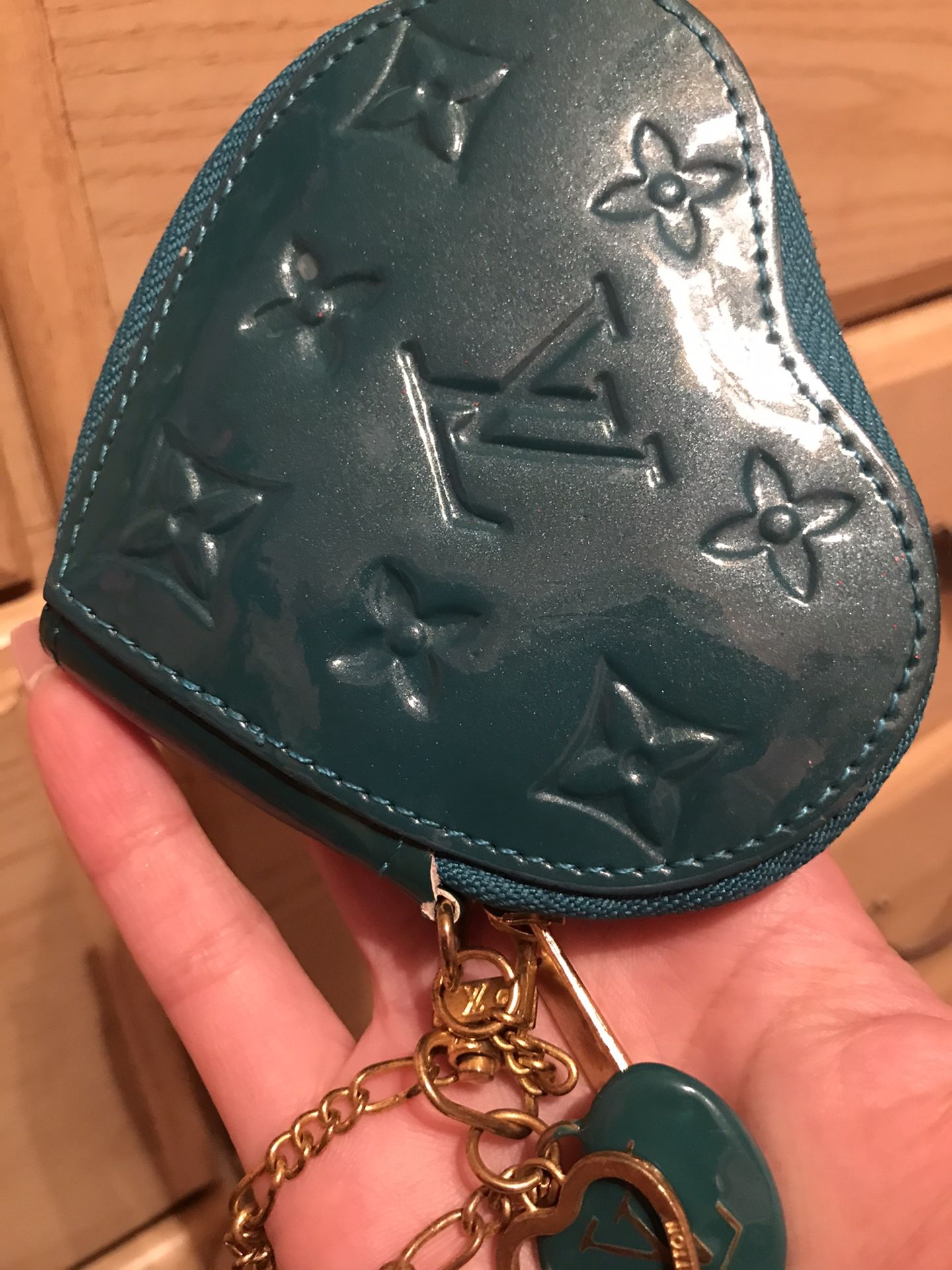 LV vernis teal heart shaped coin pouch