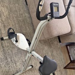 Pro-Form stationary exercise bike with digital display.